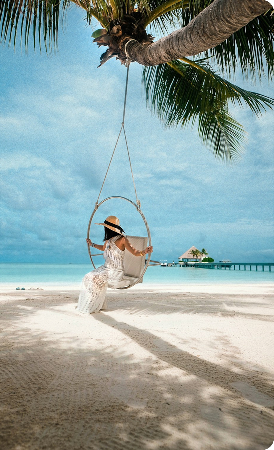 Tropical beach with swing